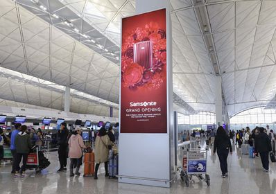 香港機場出發區七樓辦票大堂柱型燈箱廣告 香港機場出發區七樓辦票大堂柱型燈箱廣告
