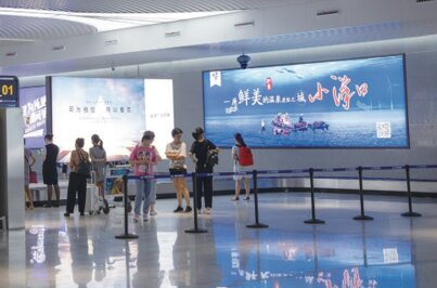 第一戶外傳媒-南通興東機場一樓行李大廳轉盤墻面燈箱